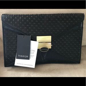 Treesje Peace Studded Clutch in Black!